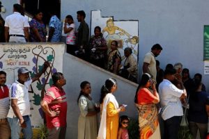 Voters queue outside a polling station to cast their ballot in the 2024 presidential election, in Colombo, Sri Lanka, September 21, 2024.