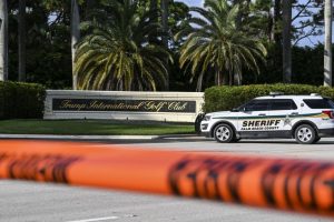 A sheriff's car blocks the street in front of the Trump International Golf Club in West Palm Beach, Florida, on September 15.