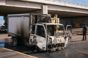 A burned truck is seen on the streets of Culiacan, Sinaloa State, Mexico, on September 11, 2024. Elements of Mexico's National Guard were deployed in the state of Sinaloa, in the northwest of the country, amid an escalation of violence that authorities attribute to internal struggles within the Sinaloa cartel following the capture of its leader, Ismael