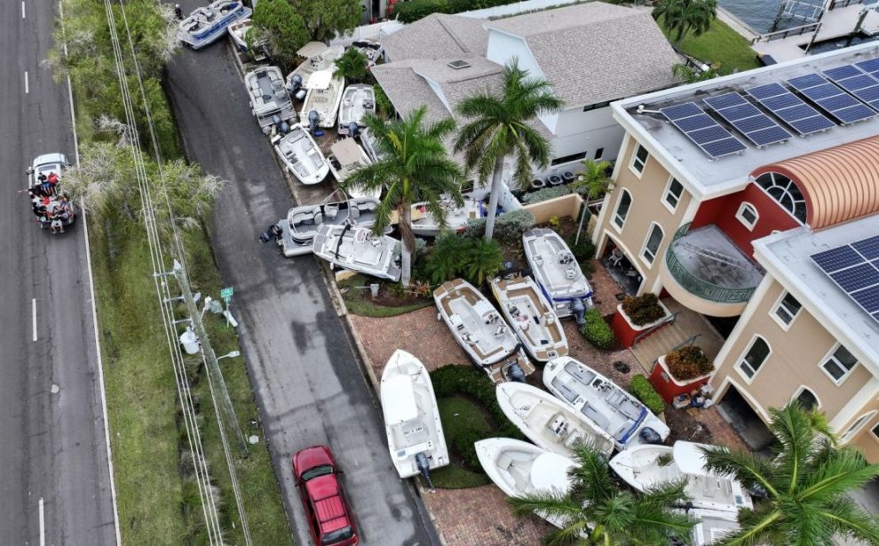 Boats displaced by Hurricane Helene in front of homes on Treasure Island, Florida, on Saturday. Joe Raedle/Getty Images