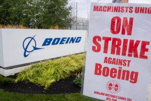 RENTON, WASHINGTON - SEPTEMBER 13: A strike sign is pictured outside a Boeing factory on September 13, 2024 in Renton, Washington. The Boeing Machinists union voted overwhelmingly to reject the airplane maker's contract offer and strike. (Photo by Stephen Brashear/Getty Images)