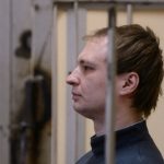 A Russian court sentences American Gilman to more than seven years in prison for assault