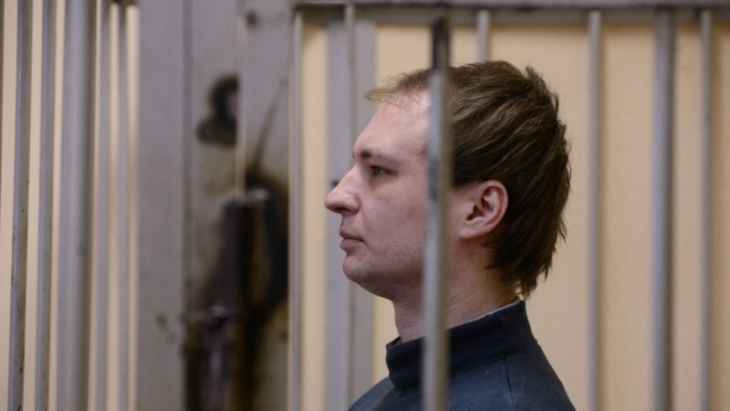 A Russian court sentences American Gilman to more than seven years in prison for assault