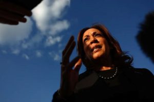 Vice President Kamala Harris speaks to the media before departing for New York from Joint Base Andrews, Maryland, Oct. 7, 2024.