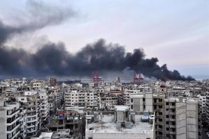 File - File image of a column of smoke following an Israeli attack on the coastal city of Latakia, western Syria