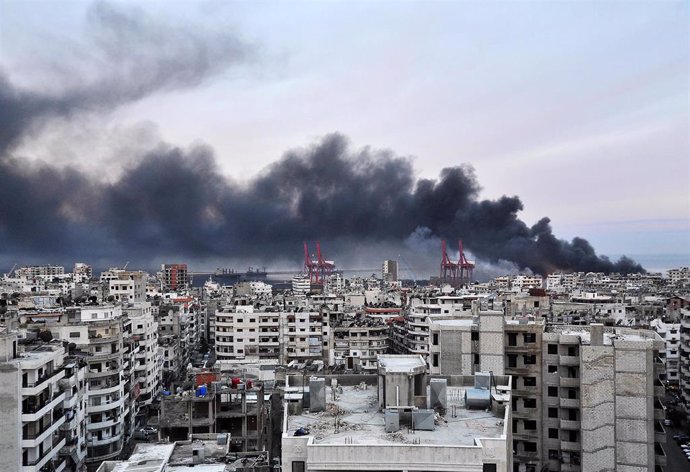 File - File image of a column of smoke following an Israeli attack on the coastal city of Latakia, western Syria