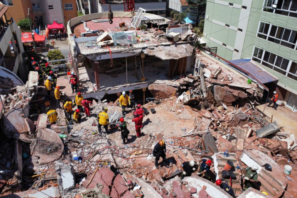 In this aerial view, rescuers search for missing people at the Dubrovnik Hotel a day after it collapsed in the coastal city of Villa Gesell, Buenos Aires province, on October 30, 2024. Credit: STRINGER/AFP via Getty Images