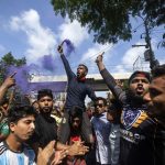 Protesters shout slogans in Dhaka, the capital of Bangladesh, on Monday.