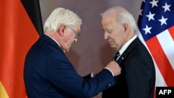 German President Frank-Walter Steinmeier honors his American counterpart Joe Biden with the Grand Cross Order of Special Merit, the highest civilian honor in Germany, in Berlin, October 18, 2024.