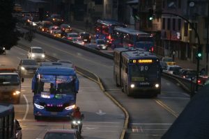 Cars circulate in the middle of a blackout in Quito, on June 19, 2024.