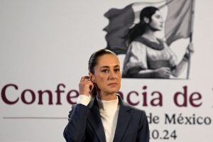 Mexico's President Claudia Sheinbaum gestures during her first morning conference at the National Palace in Mexico City on October 2, 2024.