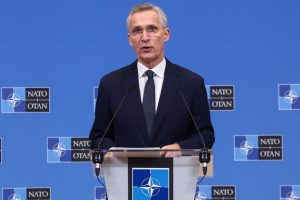 NATO Secretary General Jens Stoltenberg announcing increased spending at a press conference shortly after Trump's comments.