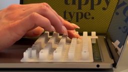 Tippy Type, the keyboard cover for those with very long nails