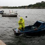 A man works to secure his boat due to Tropical Storm Helene in Havana on September 25, 2024.