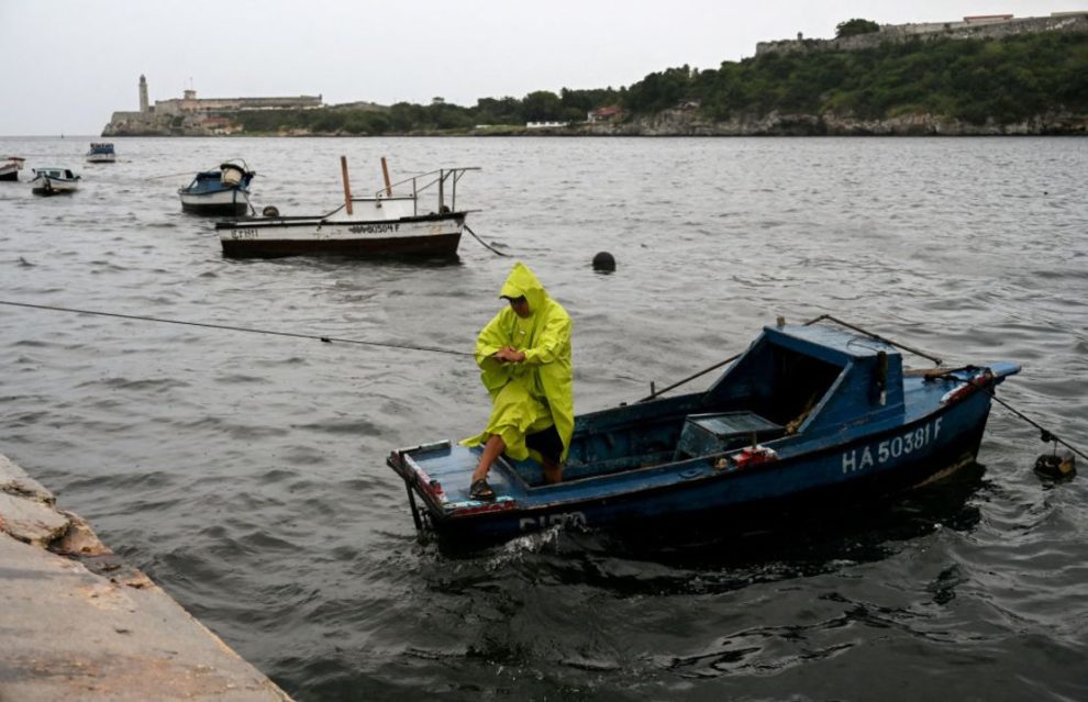 A man works to secure his boat due to Tropical Storm Helene in Havana on September 25, 2024.