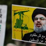 October 2, 2024, Tunis, Tunisia: Tunis, Tunisia. 02 October 2024. Several images of late Hezbollah Secretary General Hassan Nasrallah are raised during a protest outside the Municipal theater in Tunis in support of Palestinians and the Lebanese people ami