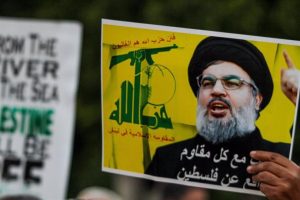 October 2, 2024, Tunis, Tunisia: Tunis, Tunisia. 02 October 2024. Several images of late Hezbollah Secretary General Hassan Nasrallah are raised during a protest outside the Municipal theater in Tunis in support of Palestinians and the Lebanese people ami