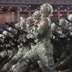 File - Archive image of North Korean soldiers at a military parade