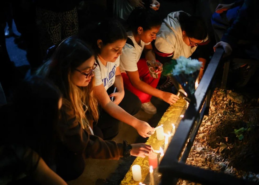 Fans place candles outside the hotel where former One Direction member Liam Payne was found dead, in Buenos Aires, Argentina, on Wednesday.