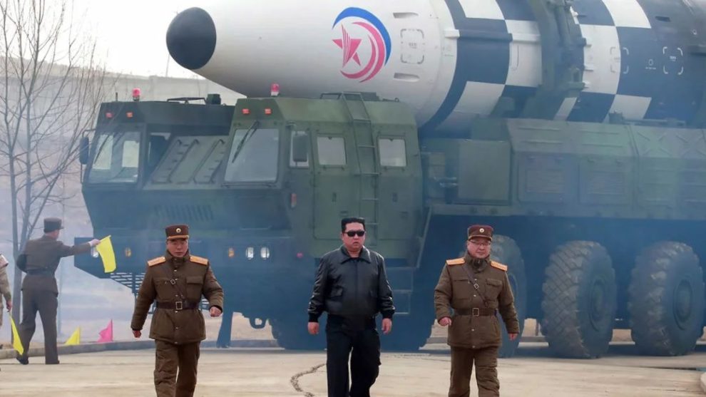 In this photo distributed by the North Korean government, North Korean leader Kim Jong Un walks around what he says is a Hwasong-17 intercontinental ballistic missile (ICBM) on the launcher, at an undisclosed location in North Korea on the 24th. March 2022.