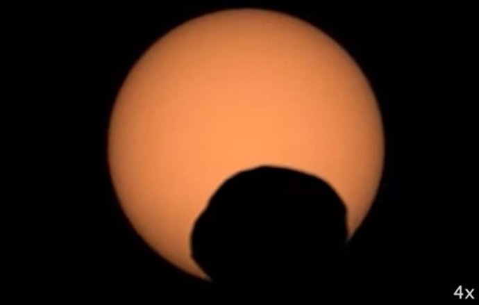 NASA's Perseverance rover captured the silhouette of the Martian moon Phobos as it passed in front of the Sun on September 30, 2024.