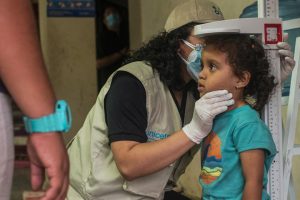 A girl receives medical assistance at a shelter in El Paraíso, Honduras.