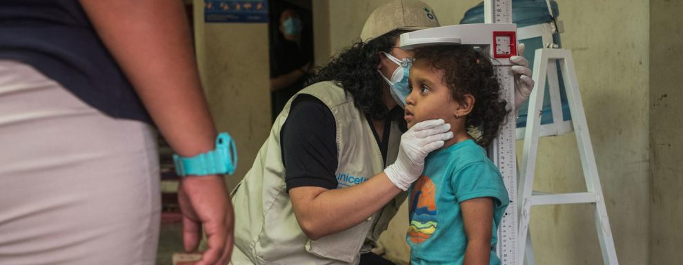 A girl receives medical assistance at a shelter in El Paraíso, Honduras.