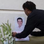 A mourner pays tribute to Alejandro Arcos in Chilpancingo, Mexico, on October 7.