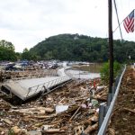 The Rocky Broad River flows into Lake Lure and overflows the city with debris from Chimney Rock, North Carolina, after heavy rains from Hurricane Helene on September 28, 2024, in Lake Lure, North Carolina.