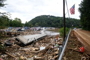 The Rocky Broad River flows into Lake Lure and overflows the city with debris from Chimney Rock, North Carolina, after heavy rains from Hurricane Helene on September 28, 2024, in Lake Lure, North Carolina.