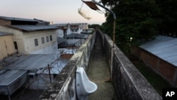 A urinal located along an observation walkway for security guards at the Tacumbu prison in Asunción, Paraguay, Sunday, July 8, 2024. AP Photo