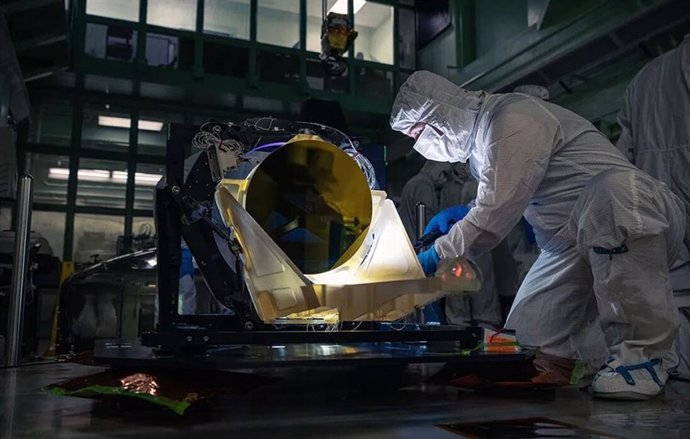 The LISA telescope prototype undergoes post-delivery inspection in a dark clean room at NASA's Goddard on May 20.