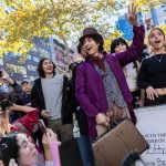 Miles Mitchell, 21, winner of the Timothee Chalamet impersonator contest near Washington Square Park, Sunday, Oct. 27, 2024, in New York. (AP Photo/Stefan Jeremías)