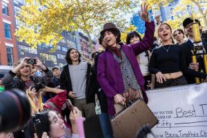 Miles Mitchell, 21, winner of the Timothee Chalamet impersonator contest near Washington Square Park, Sunday, Oct. 27, 2024, in New York. (AP Photo/Stefan Jeremías)