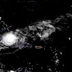 Tropical Storm Oscar brings strong winds and rain to eastern Cuba on its way to the Bahamas