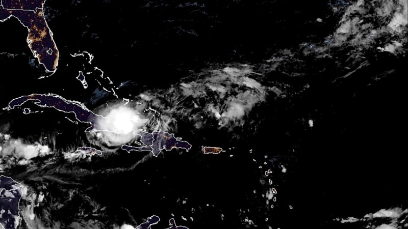 Tropical Storm Oscar brings strong winds and rain to eastern Cuba on its way to the Bahamas