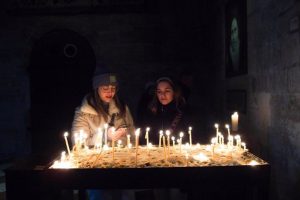 File - February 24, 2024, Vienna, Vienna, Austria: Children light candles inside the St. Stephan Church in Stephanplatz in Vienna. People gathered together to commemorate the 2 year anniversary of the unprovoked attack on Ukraine. .On February 24, 2022