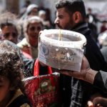 Distribution of hot meals in Gaza.