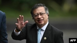 The president of Colombia, Gustavo Petro, greets his arrival at the inauguration ceremony of the elected president of Mexico, Claudia Sheinbaum.