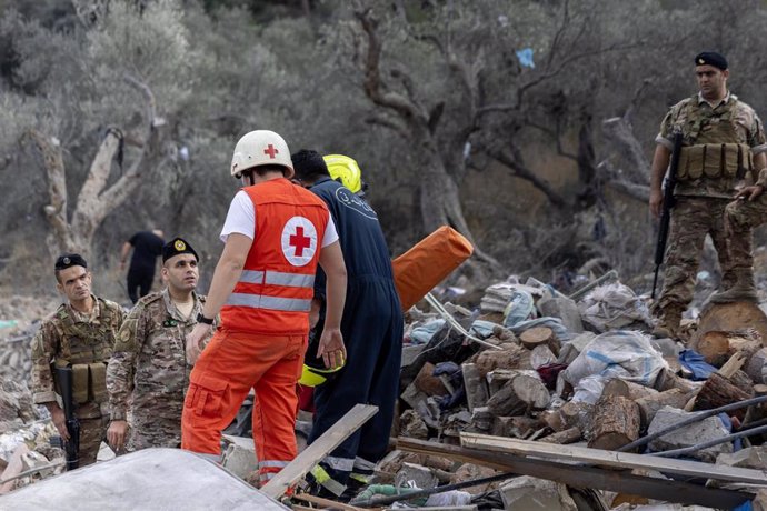 File - Emergency personnel in Lebanon after an attack by the Israeli Army