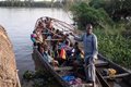 At least eight dead when a boat with more than 200 people on board capsizes in north-central Nigeria