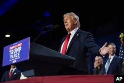 Republican presidential candidate former President Donald Trump speaks at an election night viewing party at the Palm Beach Convention Center, Wednesday, Nov. 6, 2024, in West Palm Beach, Florida. (AP Photo/Evan Vucci)