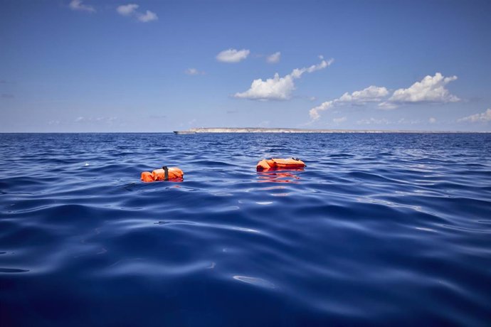 File - Some of the life jackets that the NGO Open Arms has delivered to 70 migrants traveling in a boat, on September 8, 2021, in the Mediterranean Sea, near Lampedusa, Sicily (Italy)