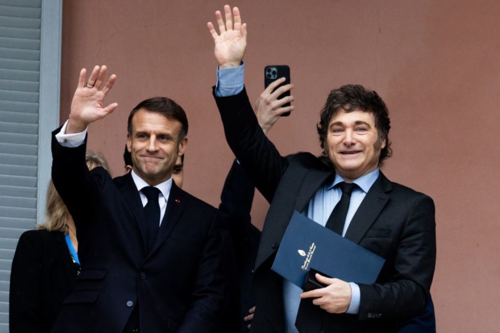 President of Argentina Javier Milei and President of France Emmanuel Macron wave from the balcony of the Argentine Government House during an official visit to the Casa Rosada on November 17, 2024 in Buenos Aires, Argentina.