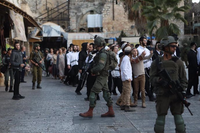 Israeli military and settlers in the city of Hebron