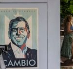 A campaign poster promoting the Puerto Rico Independence Party and the Citizen Victory Movement gubernatorial candidate Juan Dalmau is displayed on an electrical box in San Juan, Puerto Rico, Saturday, Nov. 2, 2024. AP