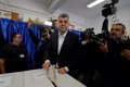 Romania is headed for a second round of presidential elections, according to first projections