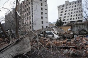 A car crushed by the rubble of buildings bombed by Russia, in the administrative center of the city of Kharkiv.