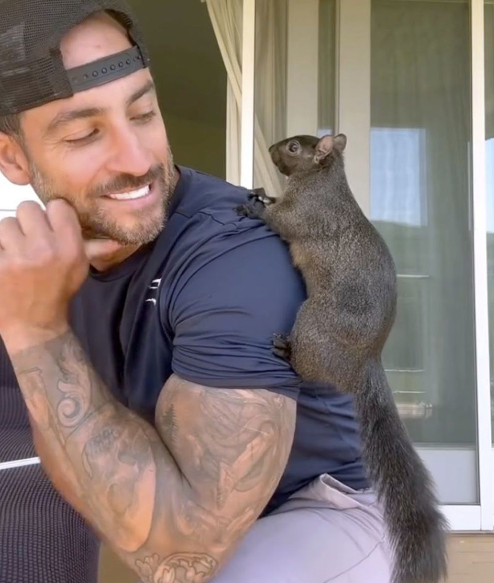 This undated image provided by Mark Longo shows him with his pet squirrel, Peanut.