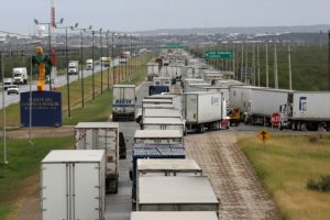 Trump vows to impose new tariffs on Canada, Mexico and China on his first day as president